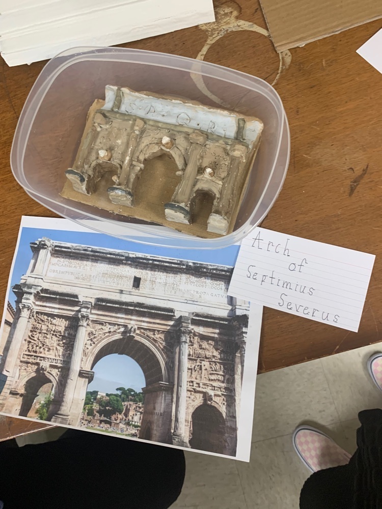 Clay model and a picture of original building