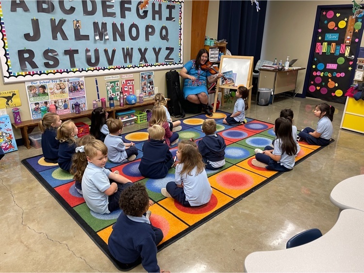 IHM PK4 Teacher playing her violin for PK3 and PK4 classes