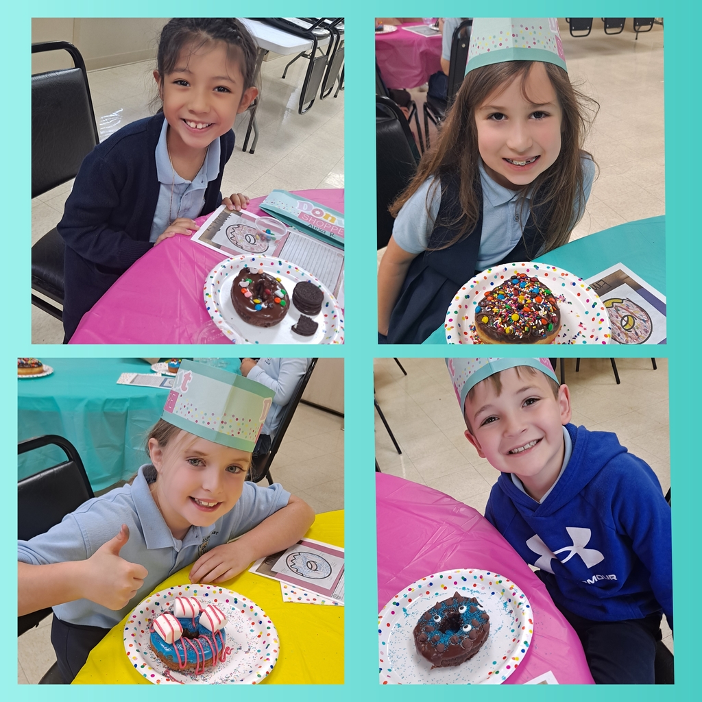 2nd graders decorating donuts